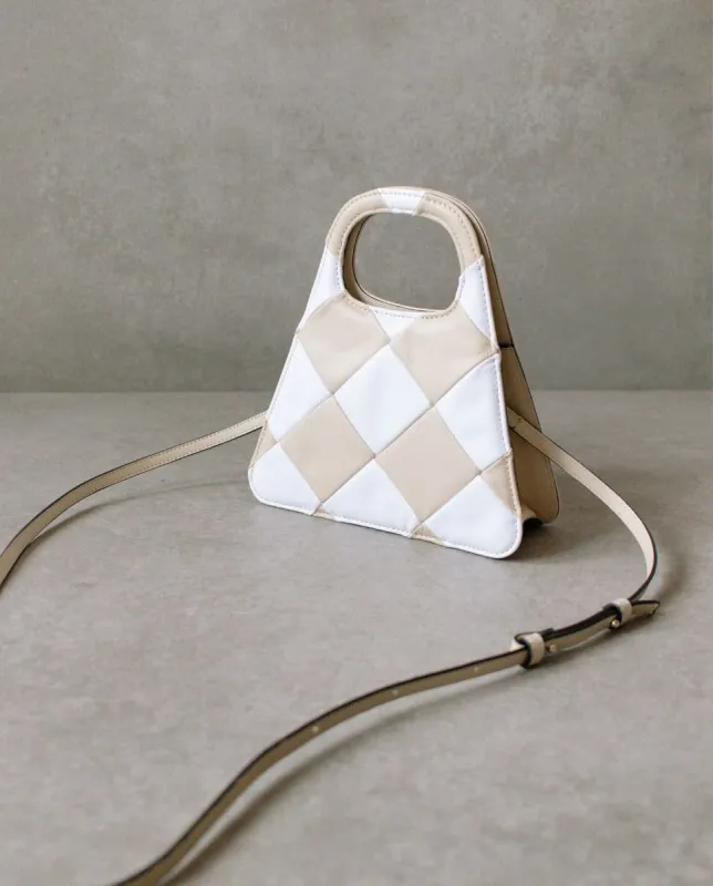 The A Scacchi Stone Beige Cream Leather Crossbody Bag sold by Alohas