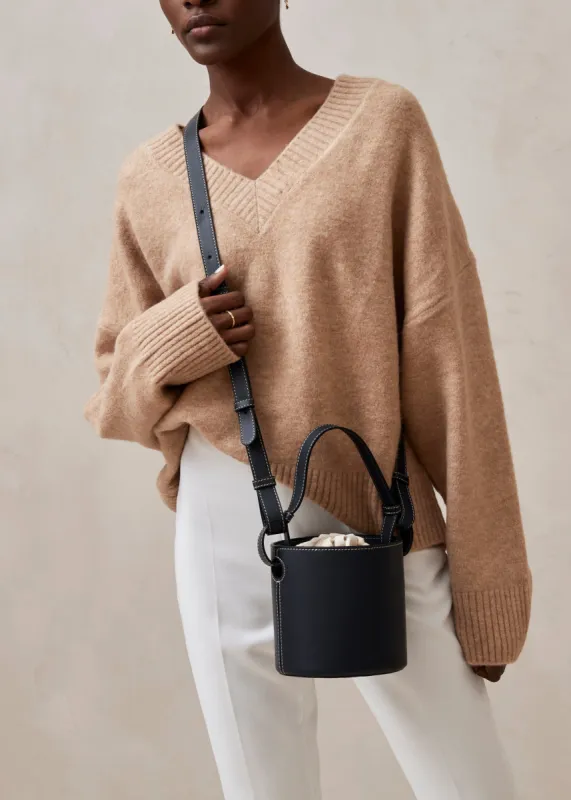 The U Lazuli Blue Leather Crossbody Bag sold by Alohas