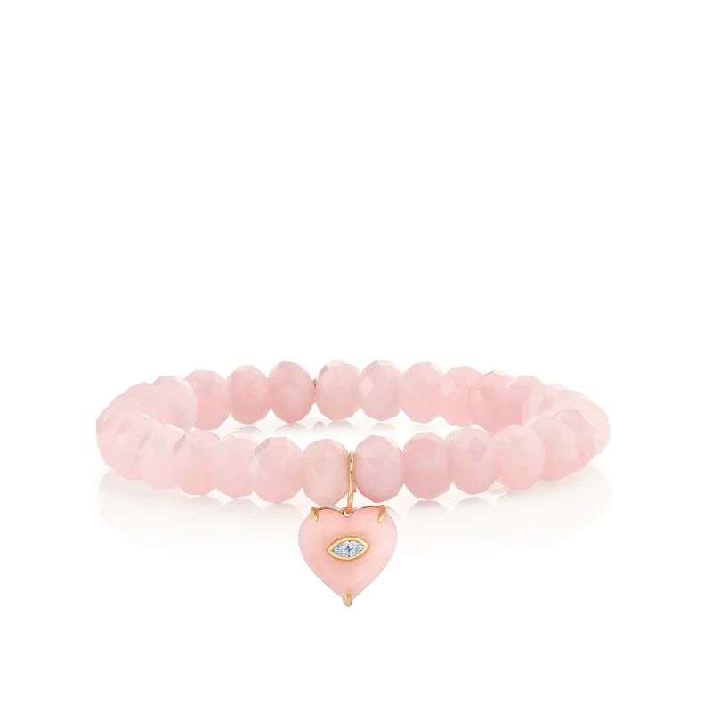 Gold & Diamond Carved Stone Heart on Rose Quartz made by Sydney Evan