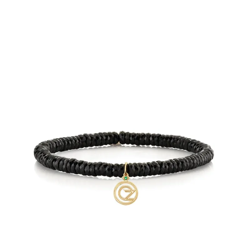 Gold & Emerald Wicked Pure Logo on Black Spinel made by Sydney Evan