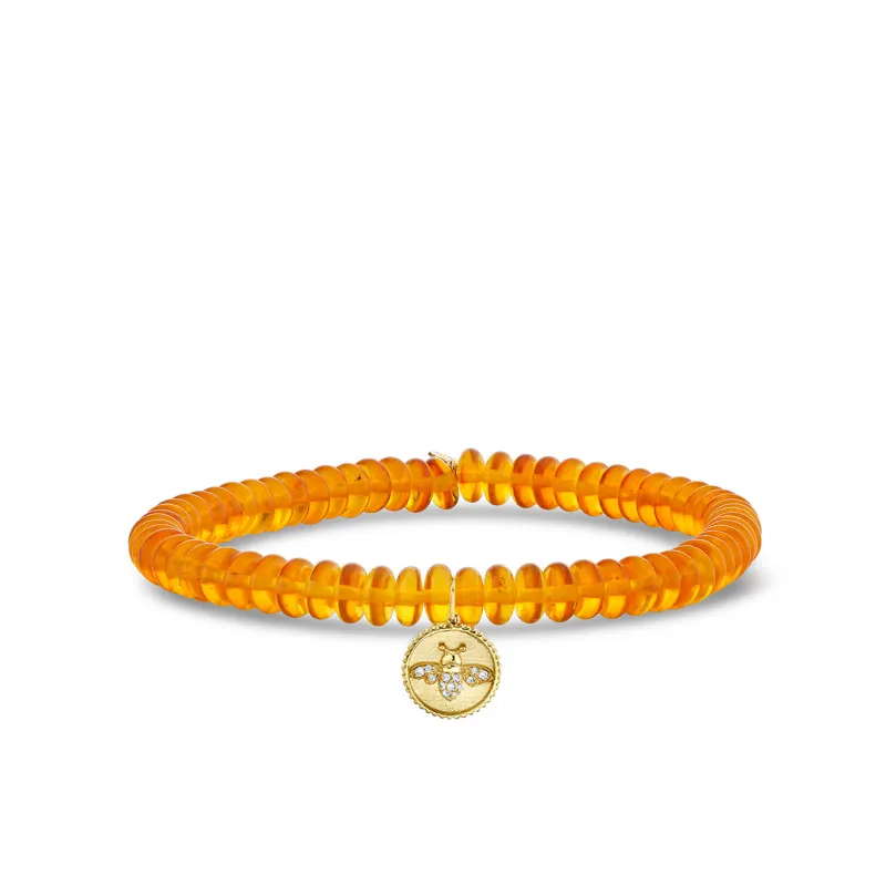 Gold & Diamond Tiny Bee Coin on Amber made by Sydney Evan