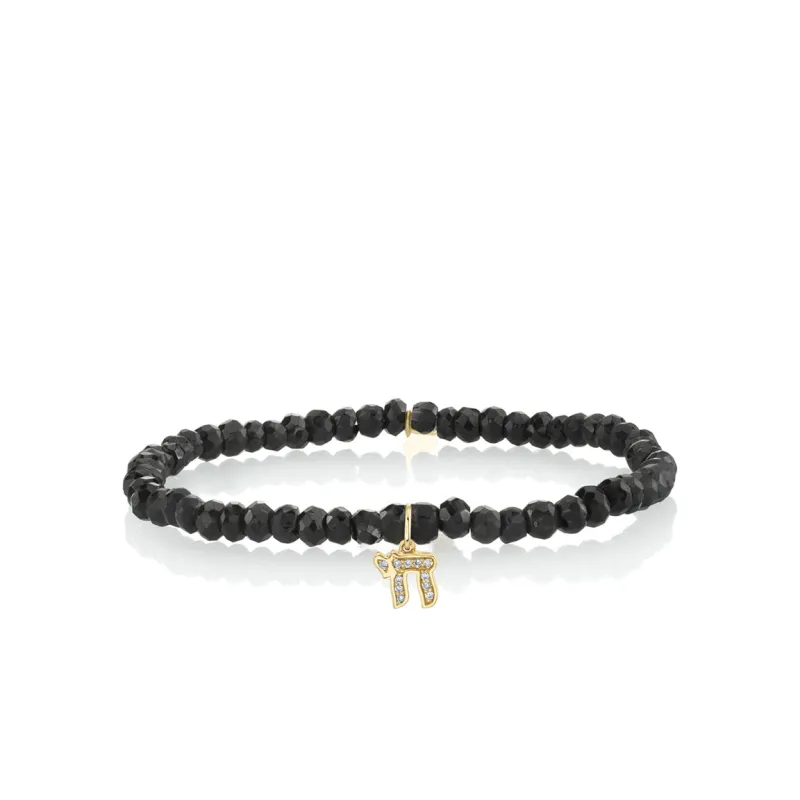 Gold & Diamond Chai on Black Spinel made by Sydney Evan
