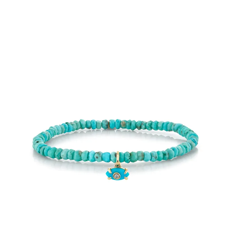 Gold & Diamond Tiny Carved Turquoise Eye on Turquoise made by Sydney Evan
