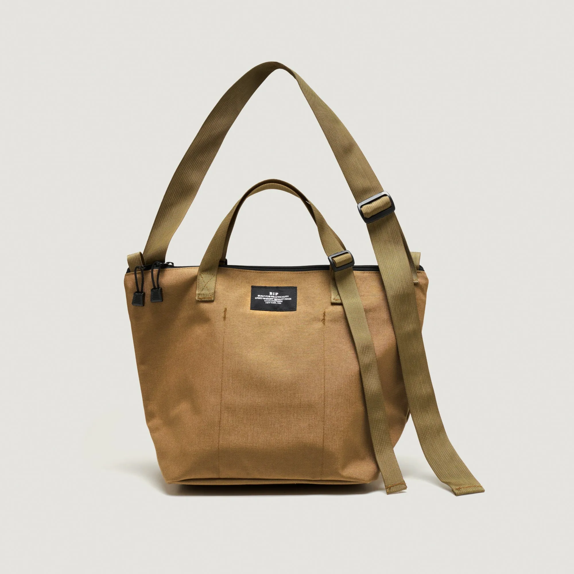 TRAVELER DUFFLE SMALL - KHAKI NYLON CANVAS sold by BAGSINPROGRESS