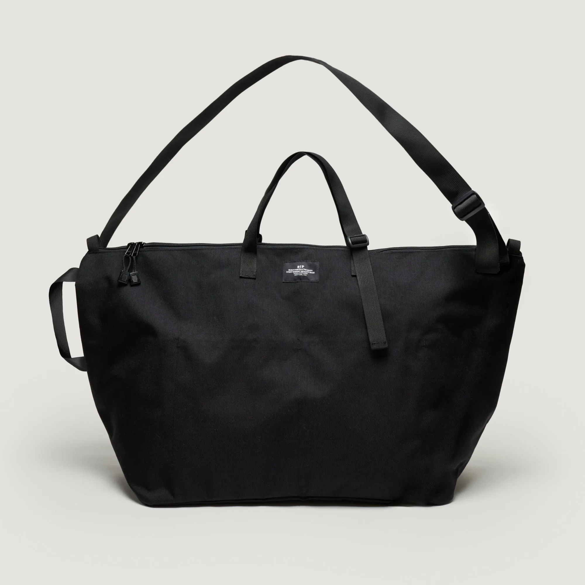 TRAVELER DUFFLE LARGE - BLACK NYLON CANVAS sold by BAGSINPROGRESS