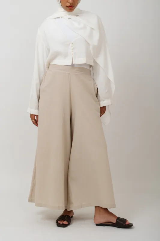 Flow wide leg pants in Beige made by Jude