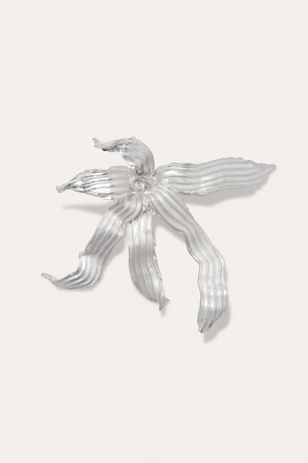 L58 - Silver Plated Brooch sold by Completed Works