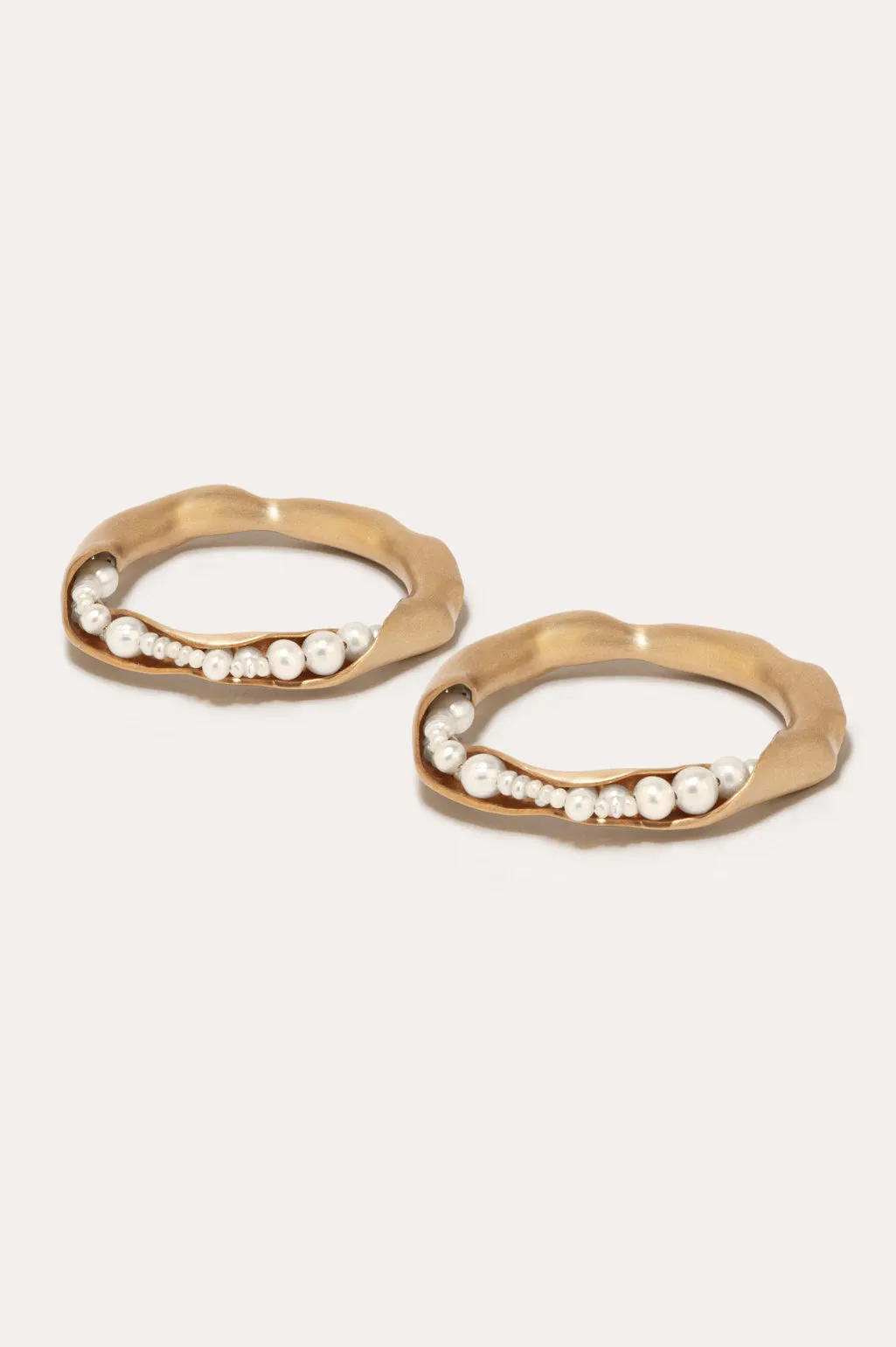 L01 - Set of 2 Napkin Rings in Brushed Brass w/ Faux Pearls sold by Completed Works product image thumbnail 3