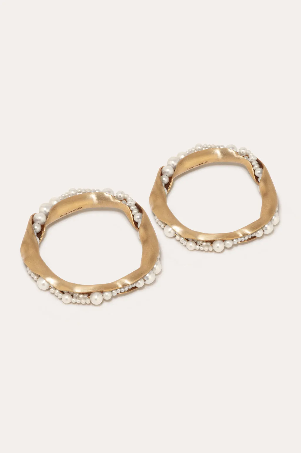 L01 - Set of 2 Napkin Rings in Brushed Brass w/ Faux Pearls sold by Completed Works product image thumbnail 2