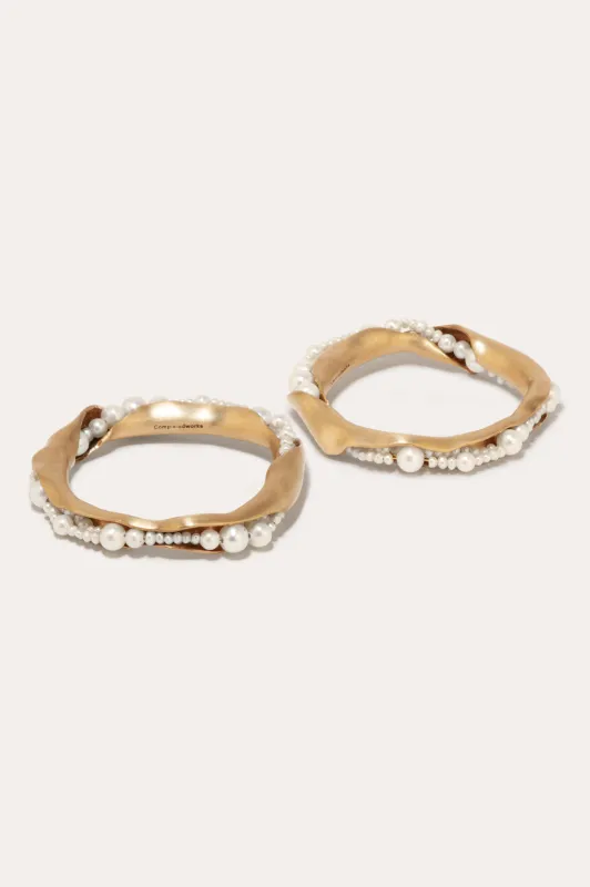 L01 - Set of 2 Napkin Rings in Brushed Brass w/ Faux Pearls made by Completed Works
