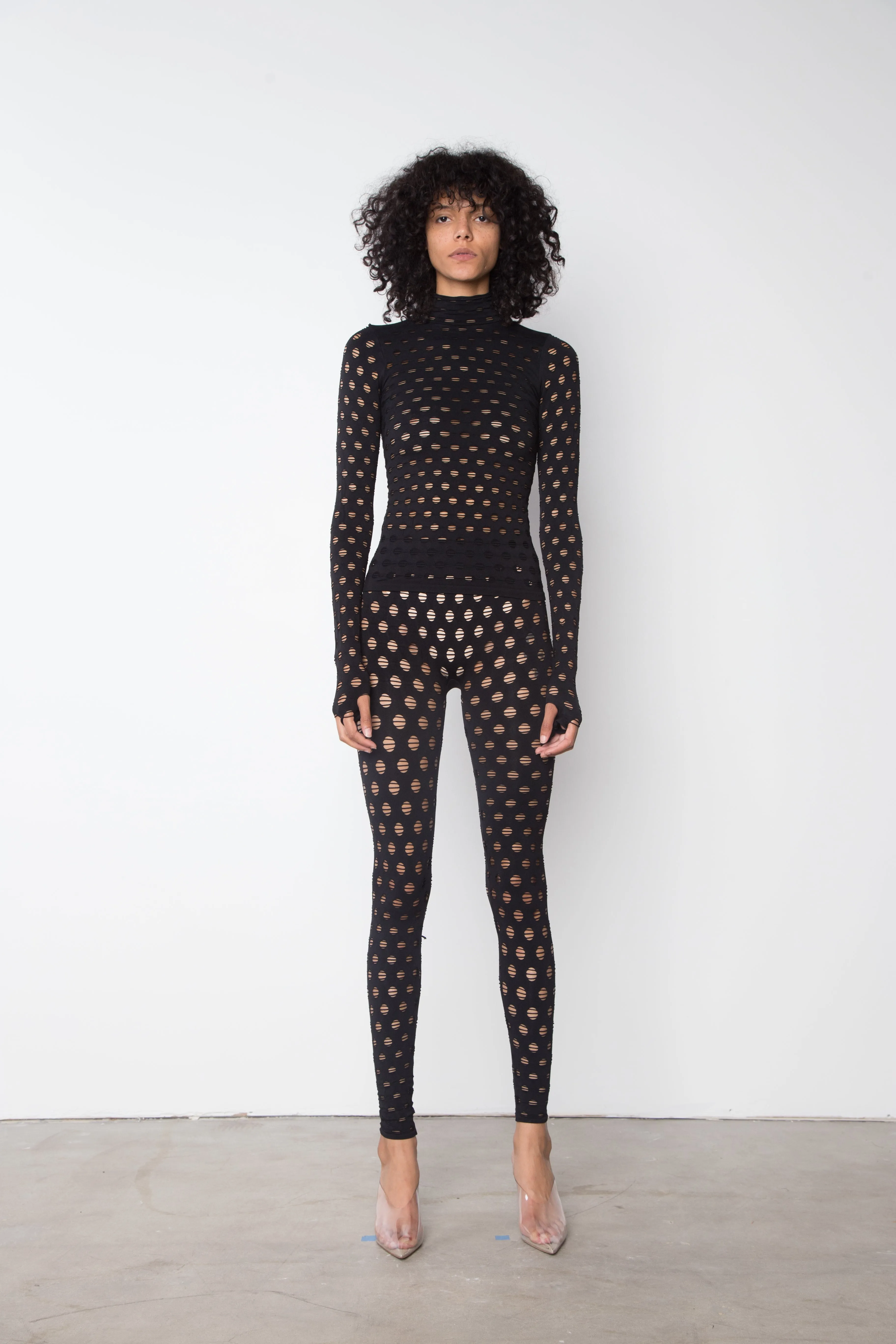 PERFORATED TURTLENECK sold by Maisie Wilen