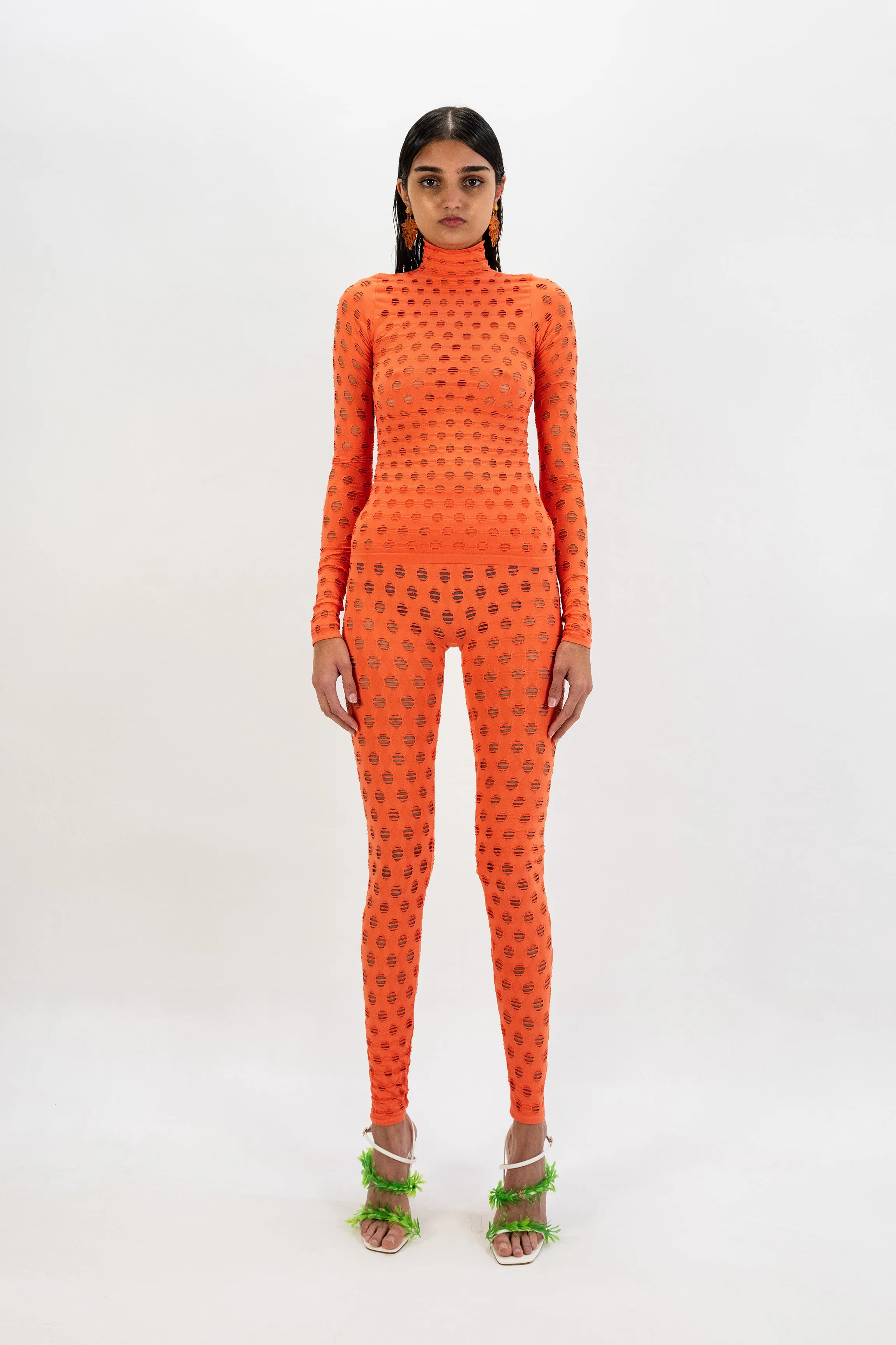 PERFORATED TURTLENECK sold by Maisie Wilen