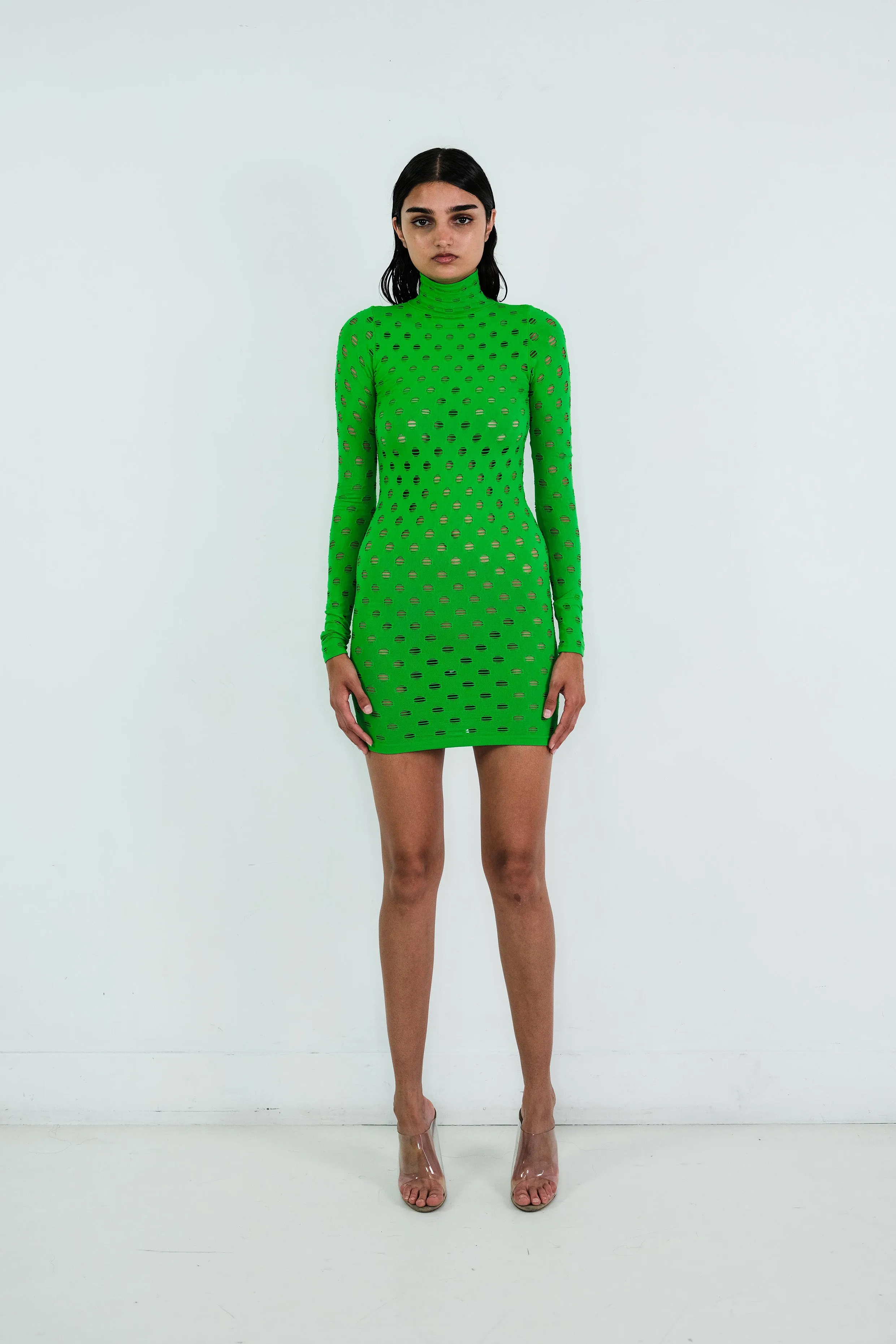 PERFORATED TURTLENECK DRESS sold by Maisie Wilen