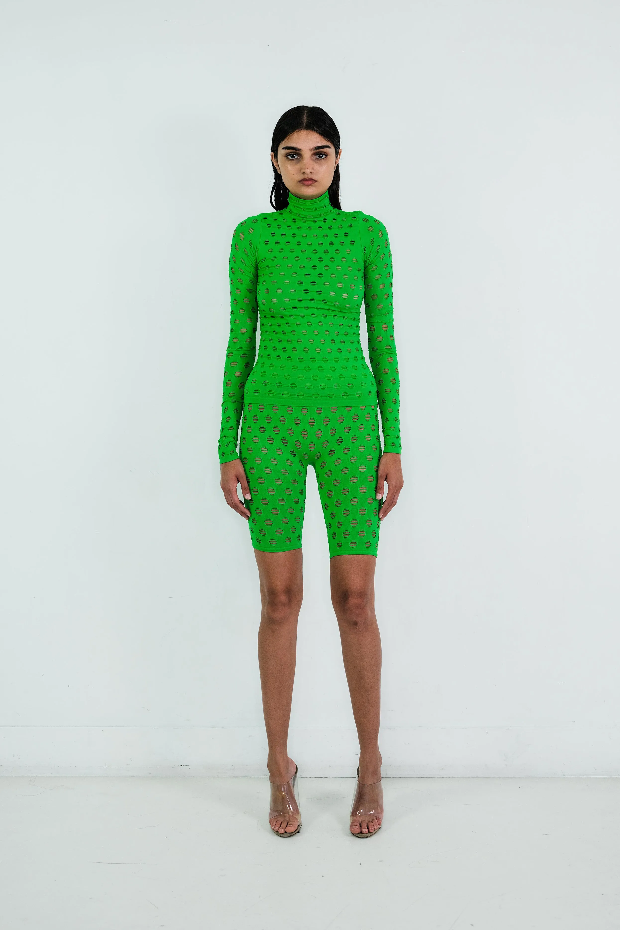 PERFORATED TURTLENECK sold by Maisie Wilen