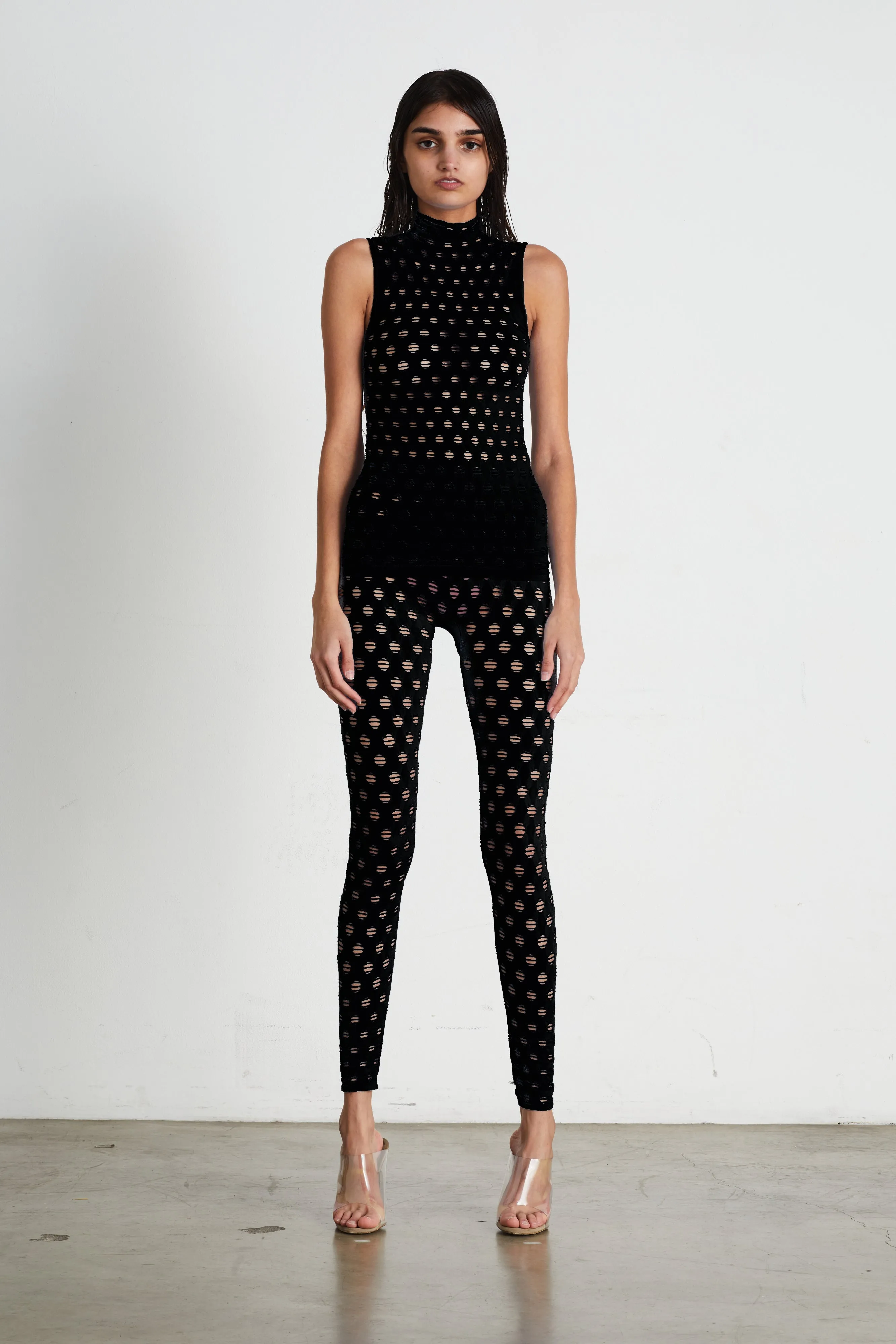 PERFORATED SLEEVELESS TURTLENECK sold by Maisie Wilen