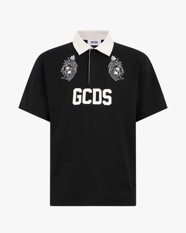 Polo con logo e fiori tribali made by GCDS