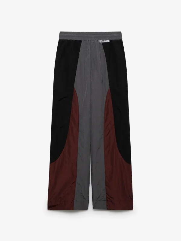 Pantaloni tuta color block made by GCDS