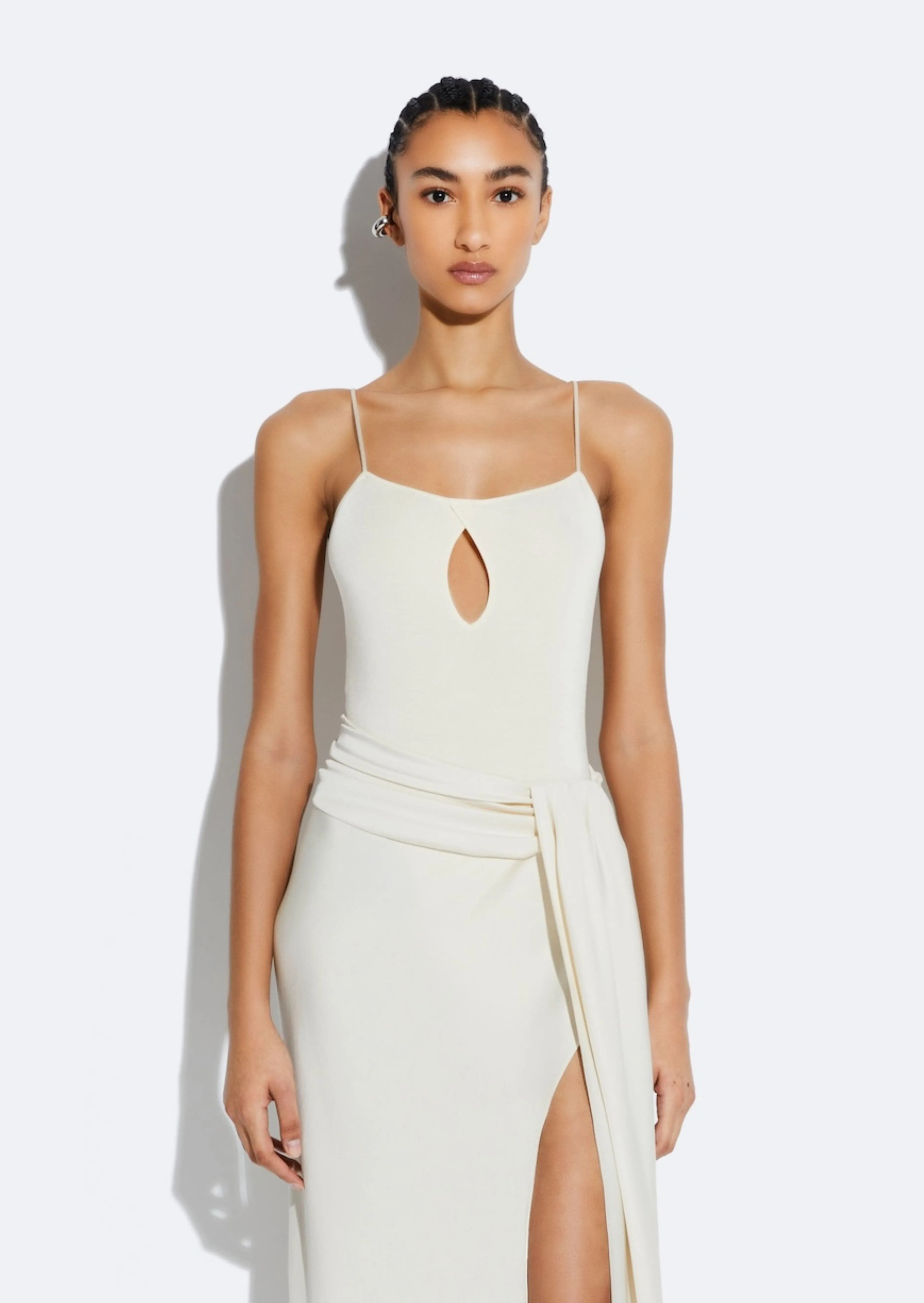 Shiny Viscose Slit Bodysuit sold by LAPOINTE
