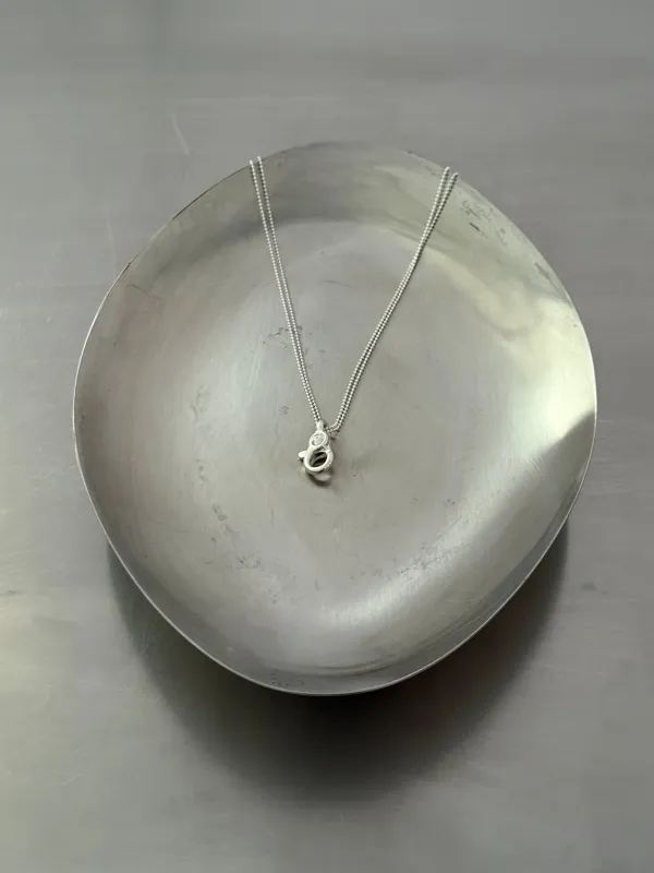 TRIGGER ATTACHMENT CHAIN made by MARTINE ALI