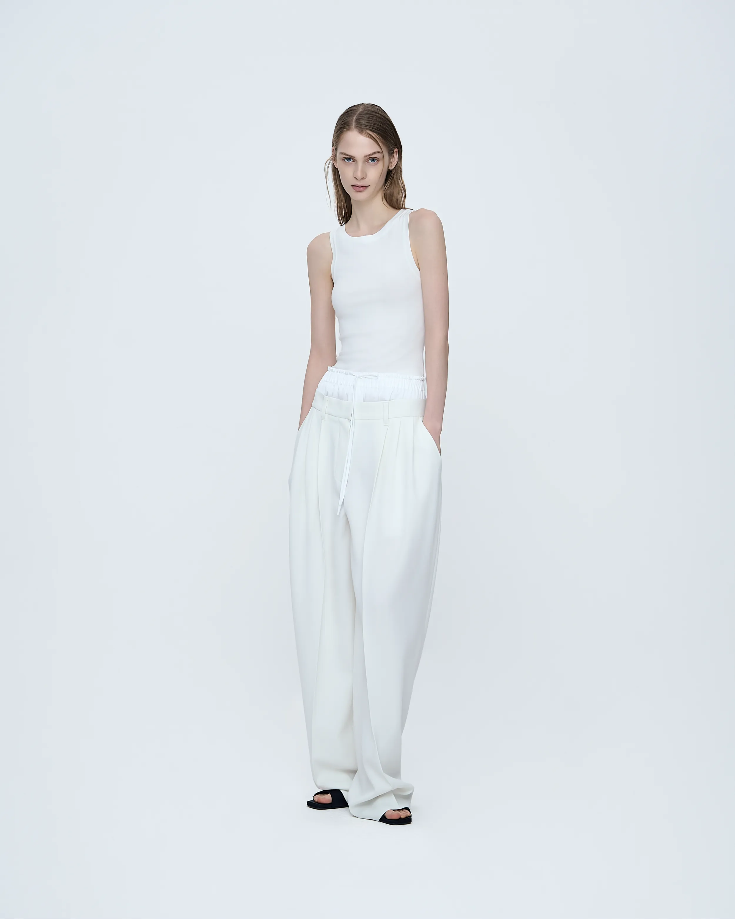 Essential Sleeveless Knit Top sold by SYSTEM