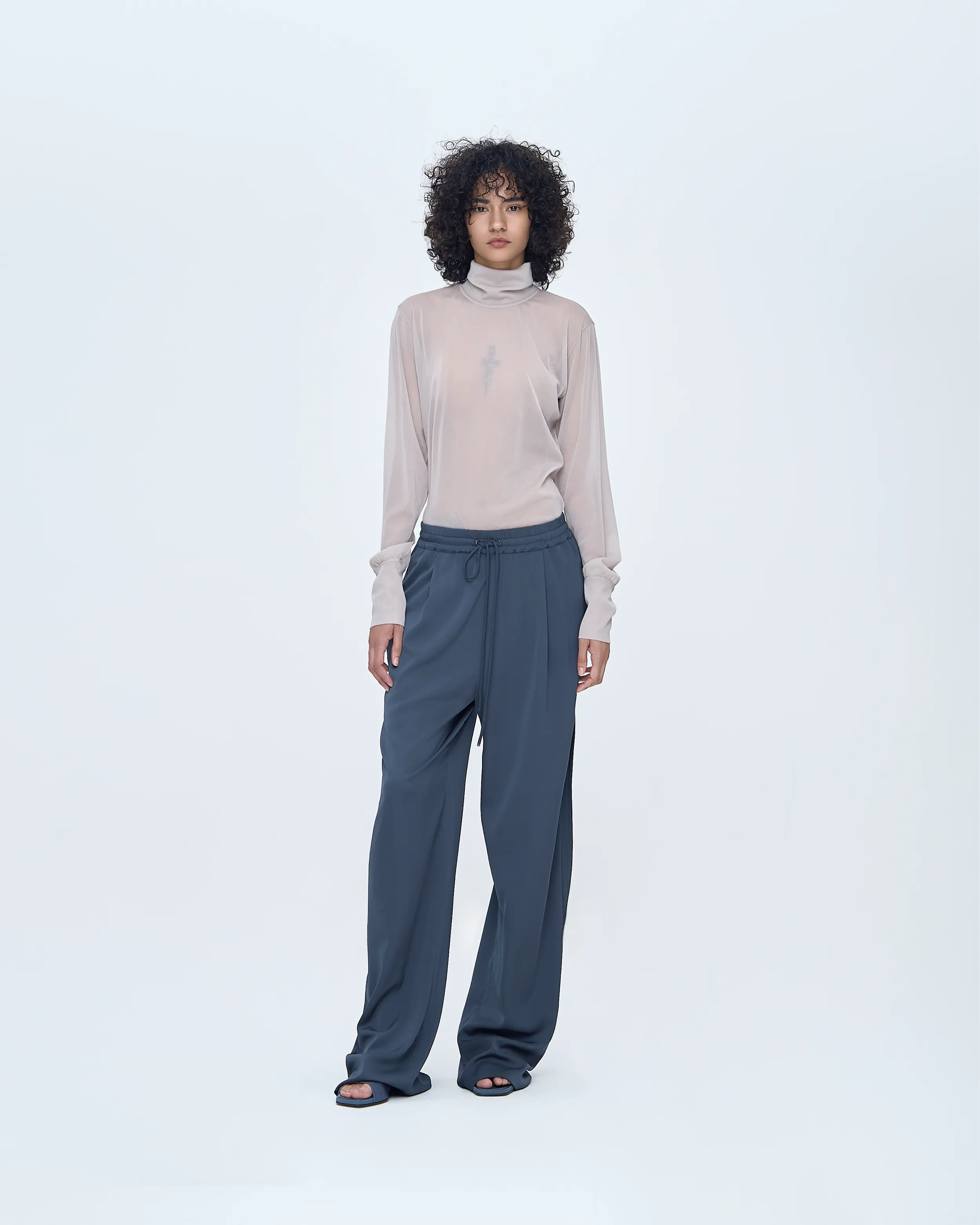 Back-Point Long Sleeve Top sold by SYSTEM