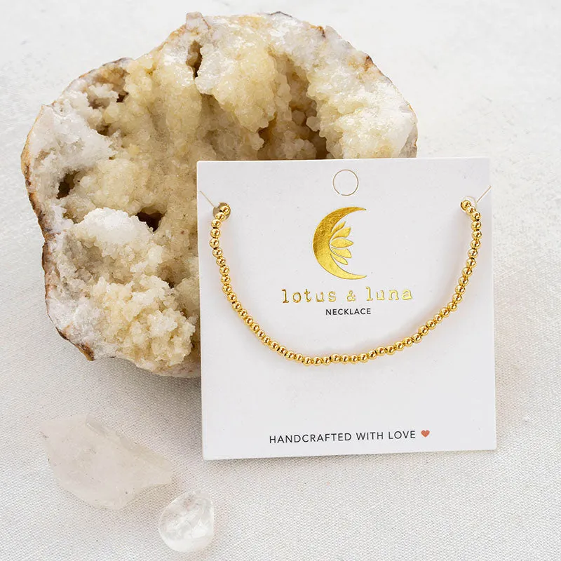 3mm Gold Ball Necklace sold by Lotus & Luna product image thumbnail 4