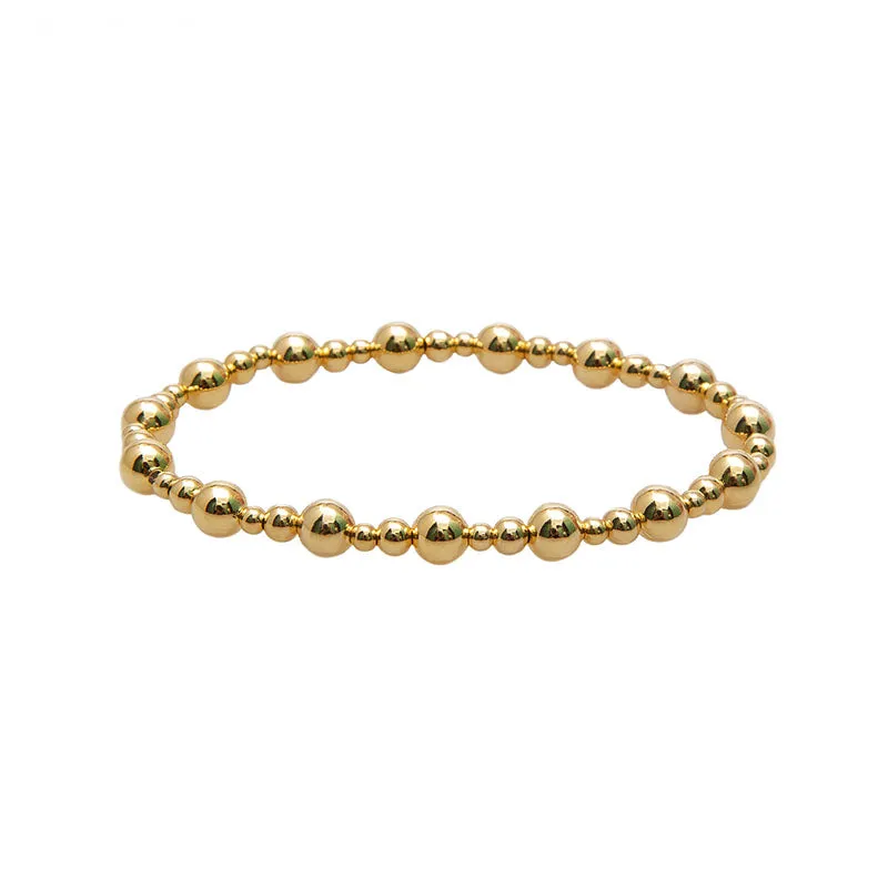 Gold Mixed Stretch Bead Bracelet sold by Lotus & Luna