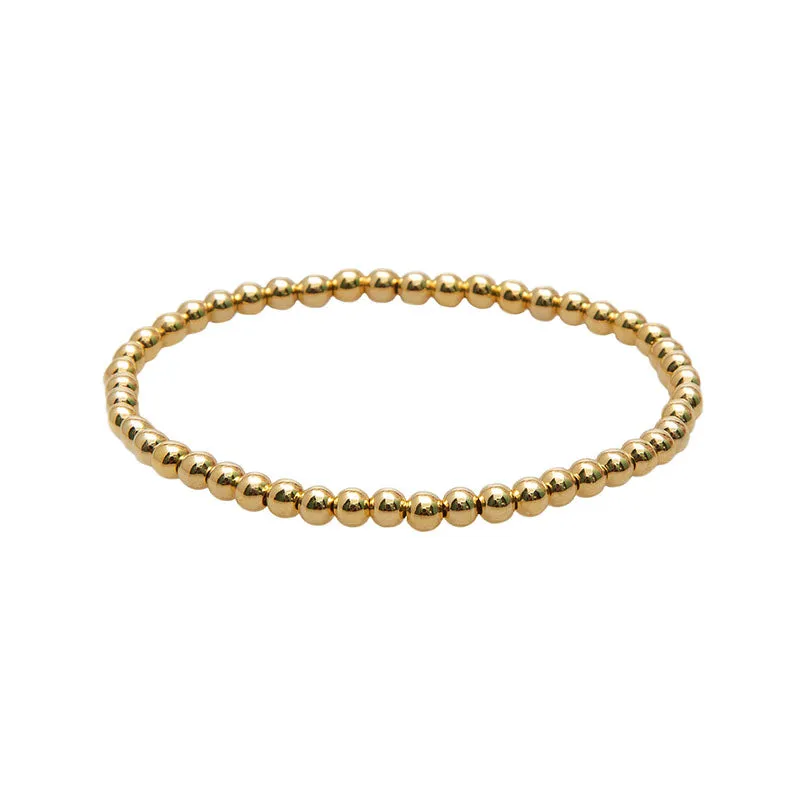 Gold 4mm Stretch Bead Bracelet sold by Lotus & Luna