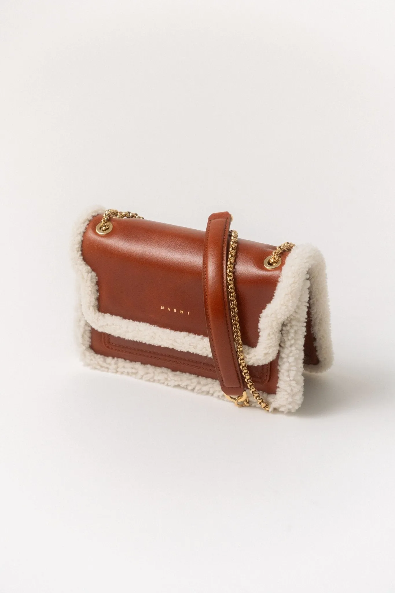 Marni Trunk Small Shearling-Lined Leather Shoulder Bag sold by Bessette