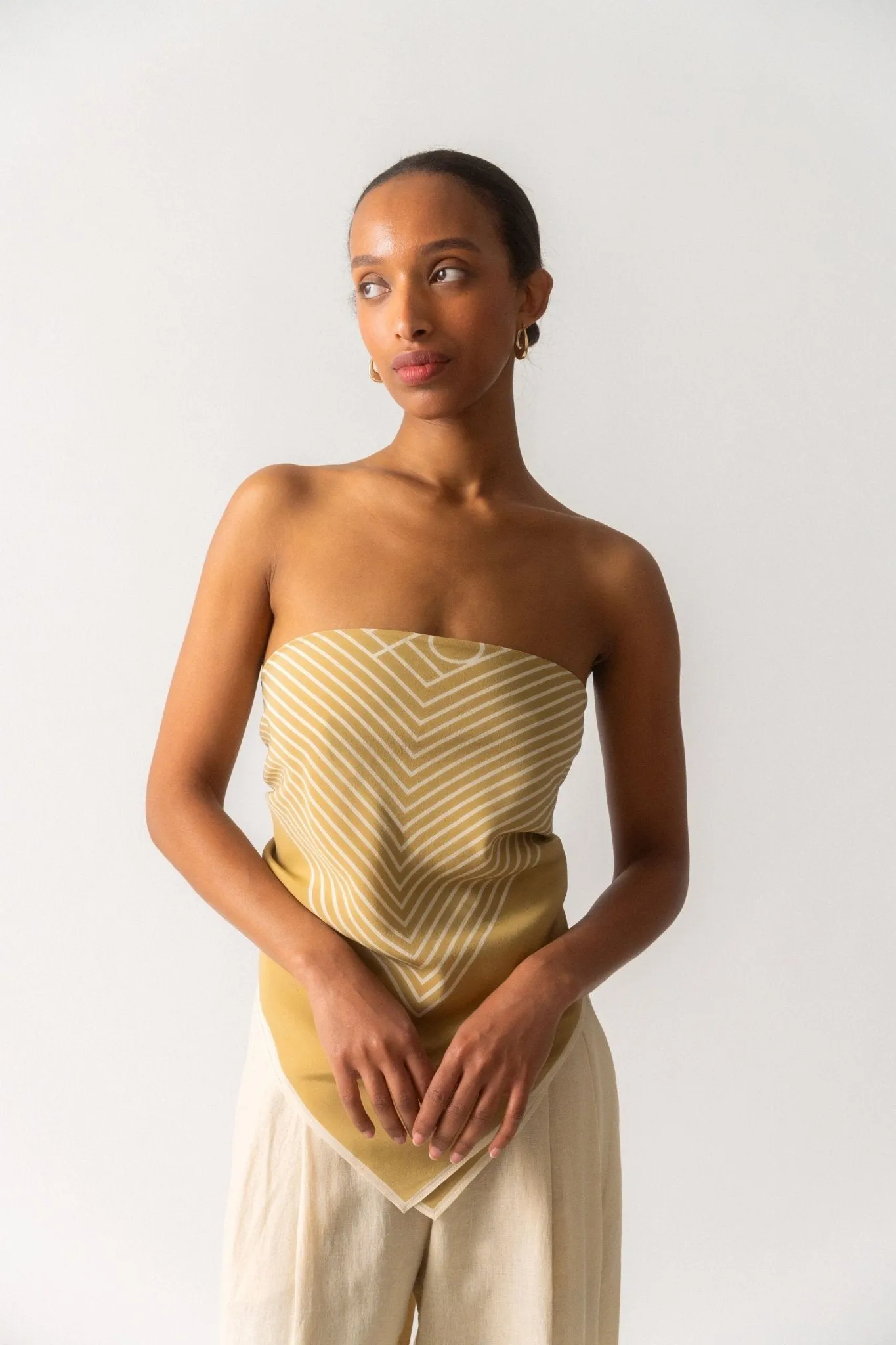 Toteme Centered Monogram Silk Scarf Peanut Butter sold by Bessette