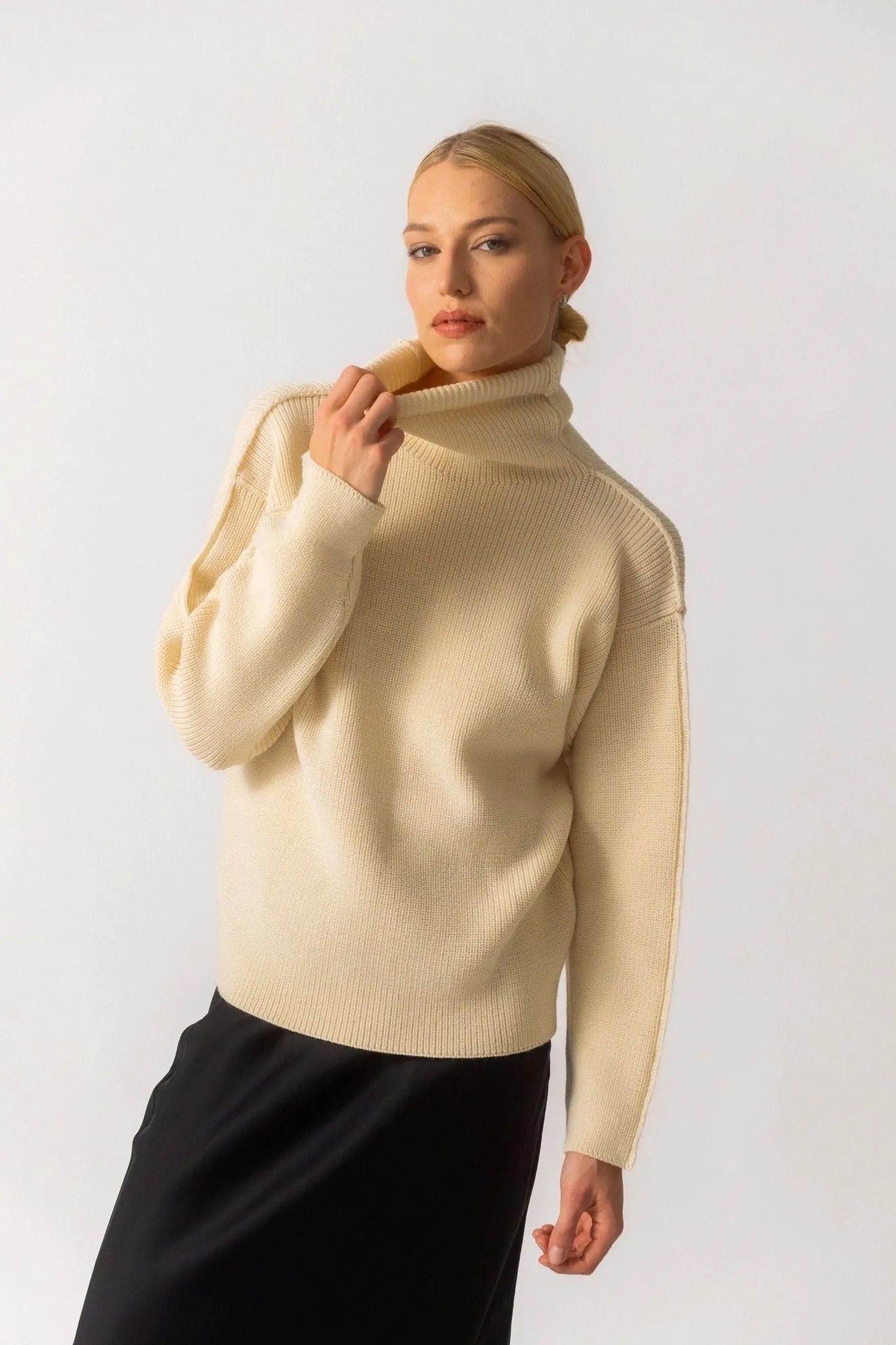 Róhe Off-White Unisex Turtleneck Seam-Detail Sweater sold by Bessette