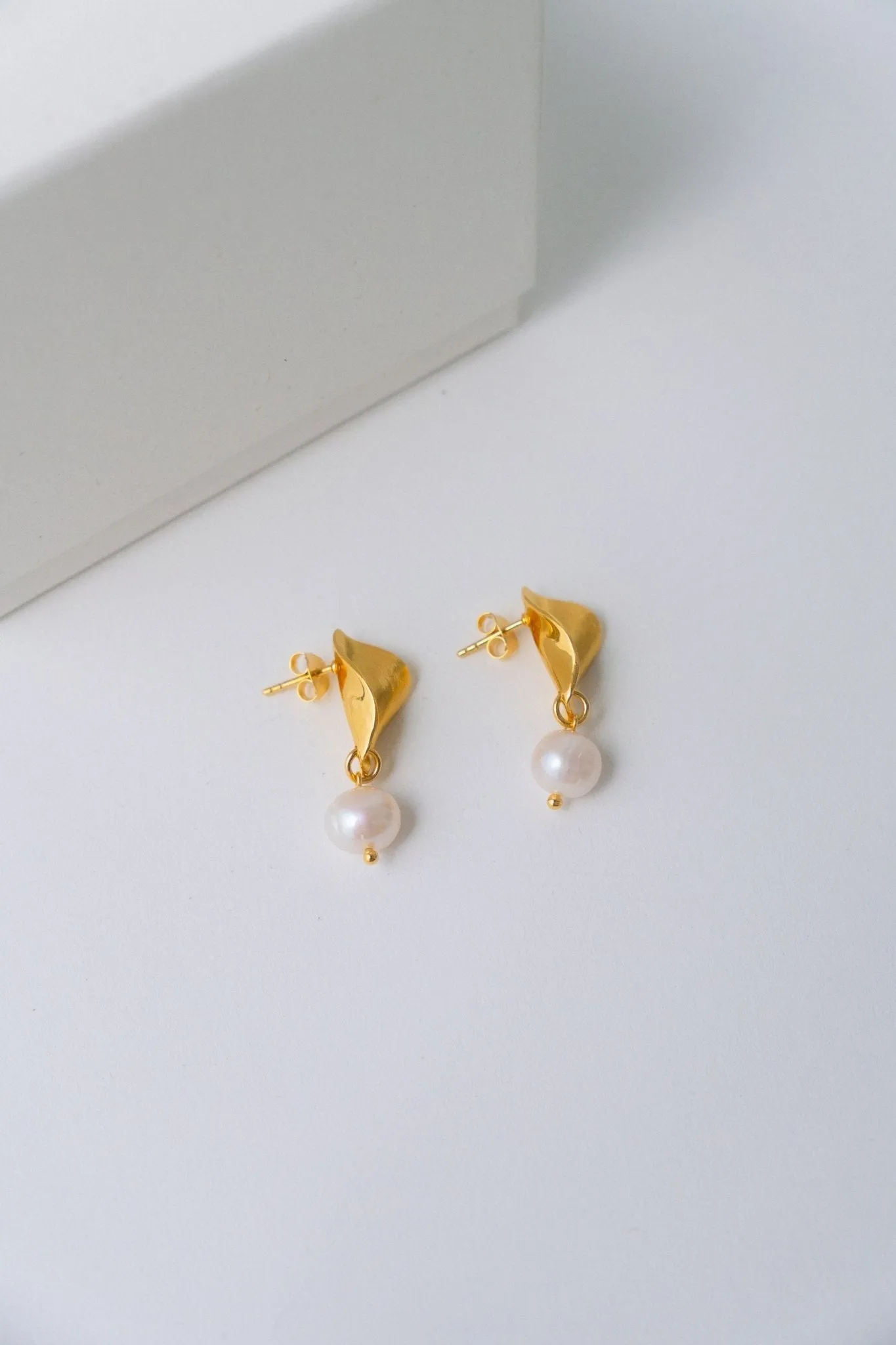 Completedworks Folded Gold Earrings with Pearl sold by Bessette product image thumbnail 4