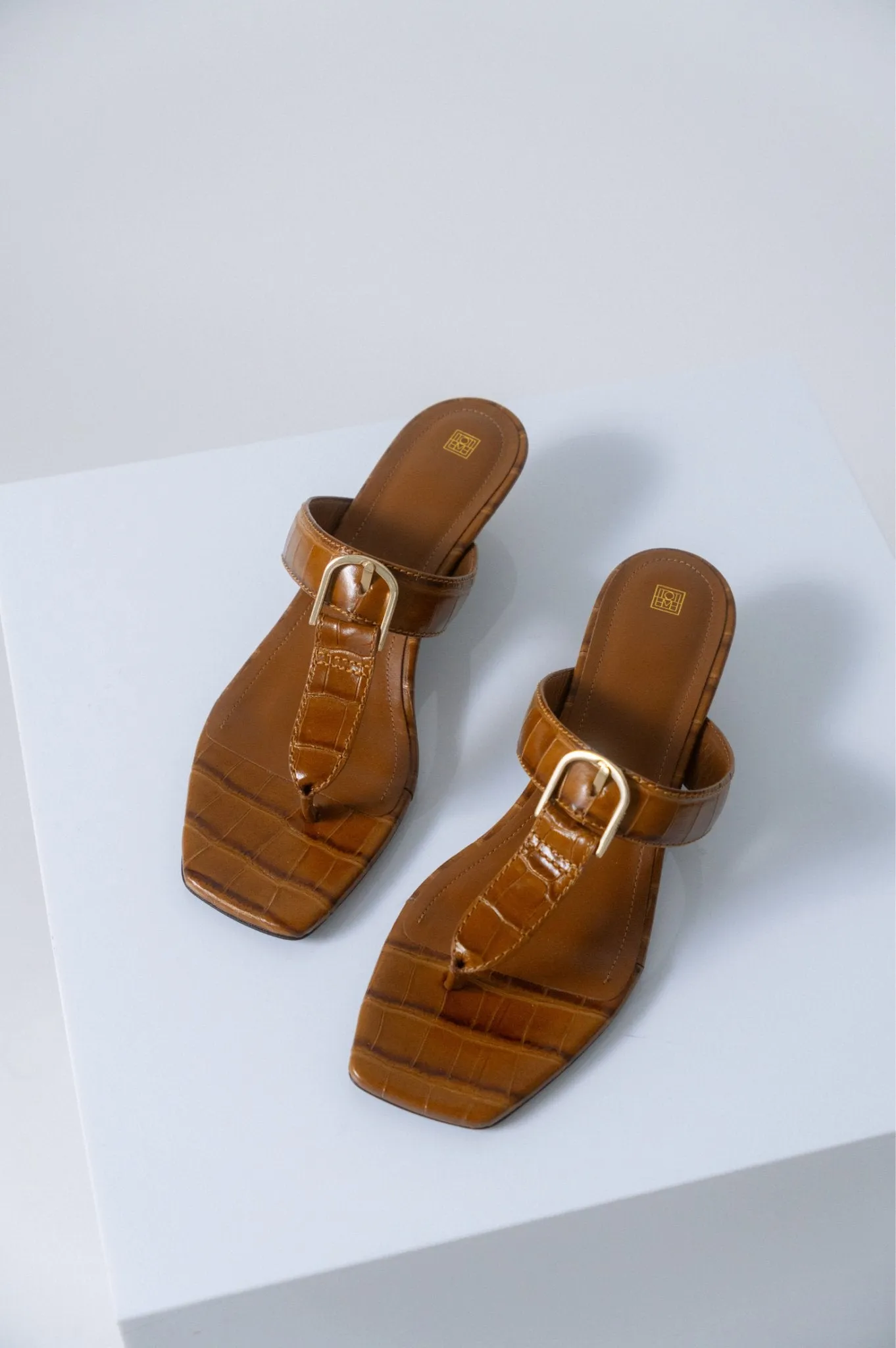 Toteme Croc-Effect Belted Leather Sandals (40 EU) sold by Bessette