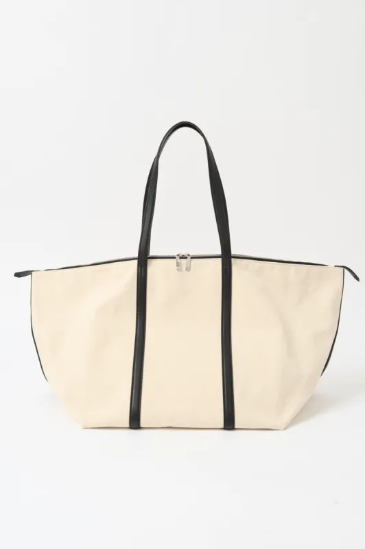 Toteme Canvas Weekender sold by Bessette