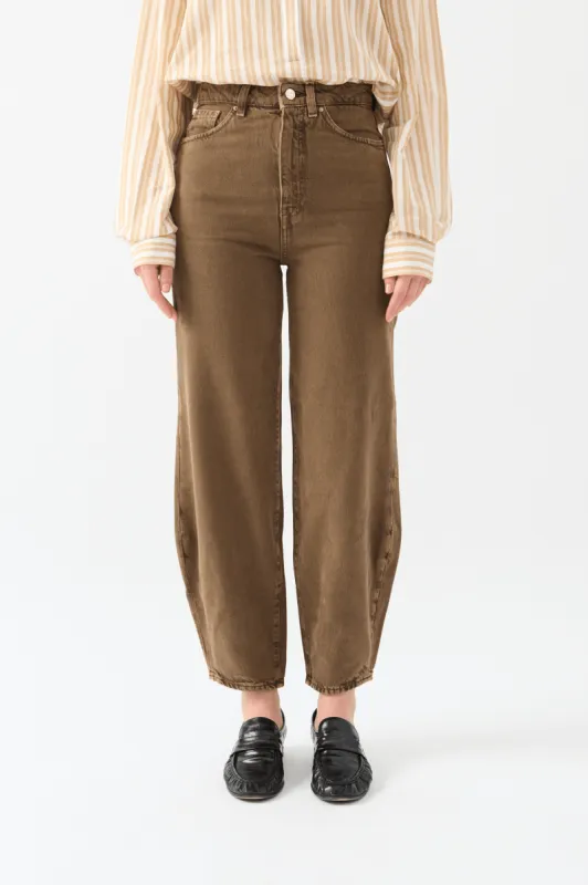 Toteme Chocolate Barrel Leg Denim sold by Bessette