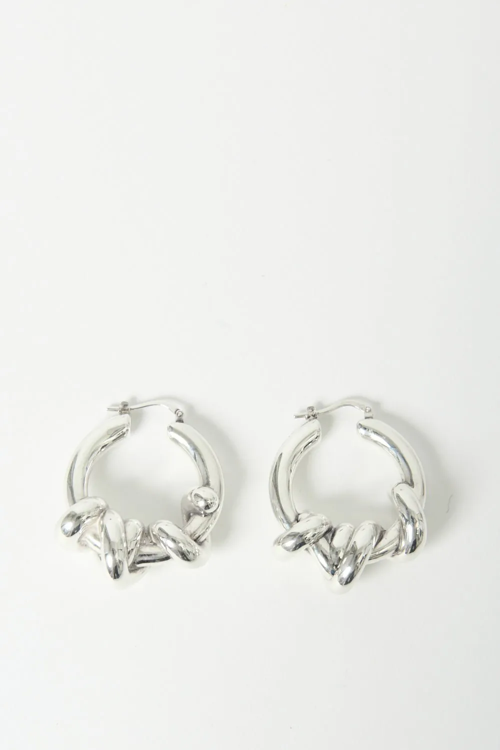 Jil Sander Knot-Detail Hoop Earrings sold by Bessette