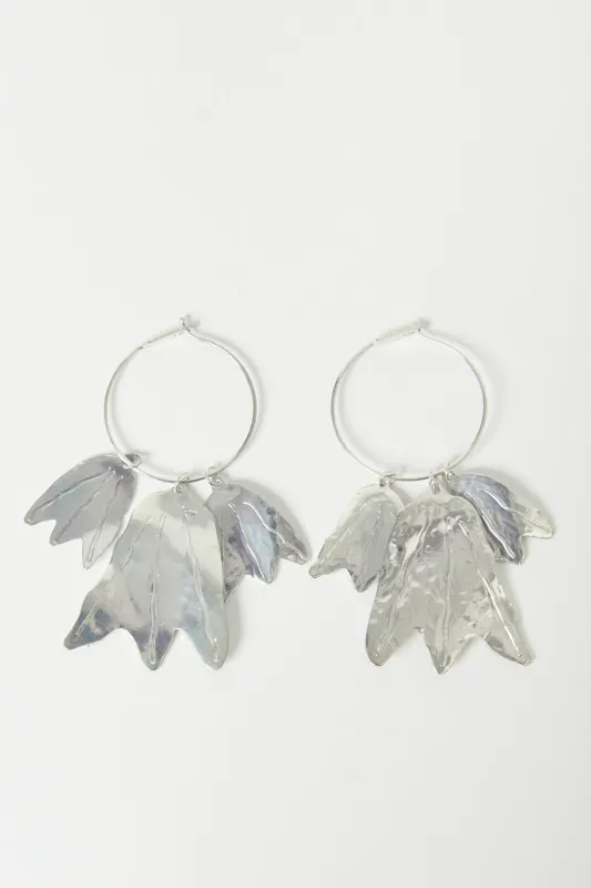 Jil Sander Hammered-Effect Finished Drop-Designed Earrings sold by Bessette