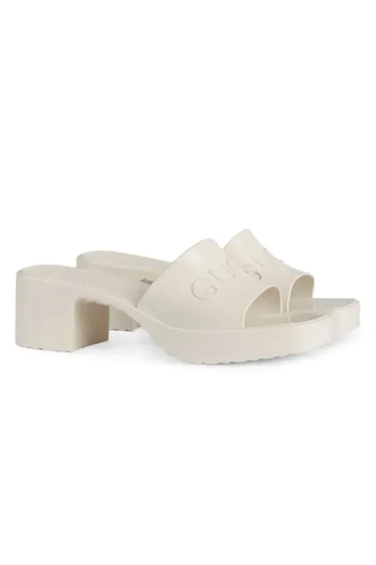 Gucci White Embossed Rubber Mule sold by Bessette