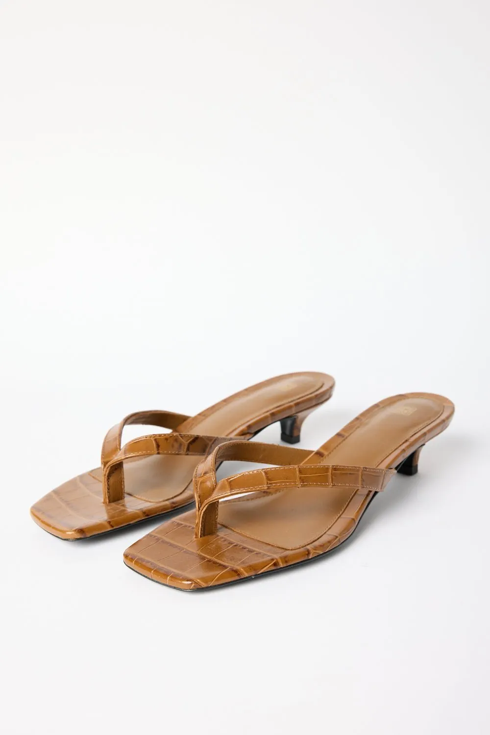 Toteme Croco-Embossed Heeled Flip Flops sold by Bessette