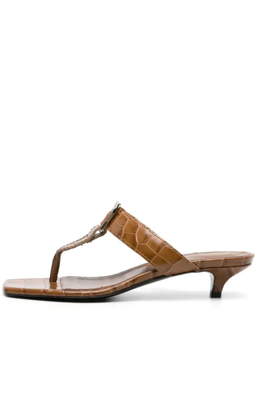 The Belted Camel Croco Flip-Flop Heel sold by Bessette