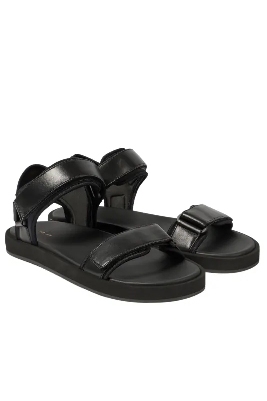 The Row Hook-and-Loop Sandals sold by Bessette