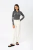 Toteme White Barrel Leg Denim Jean sold by Bessette