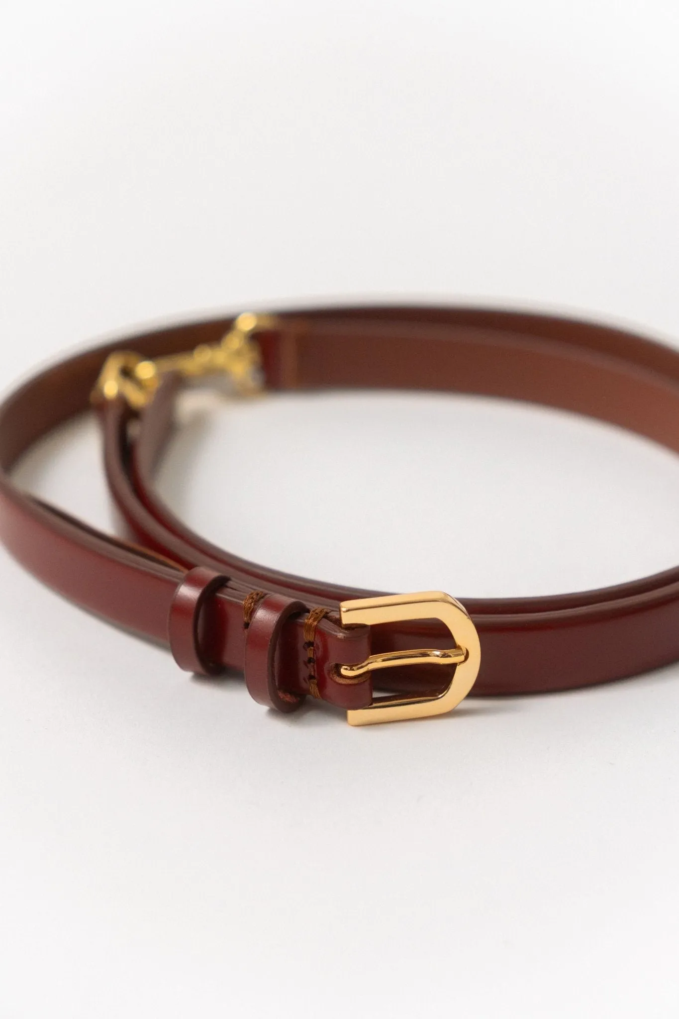Toteme Double Clasp Leather Belt Cognac sold by Bessette