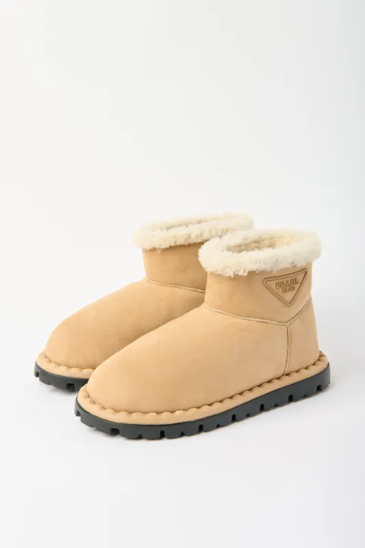 Logo Shearling-Lined Ankle Boots sold by Bessette