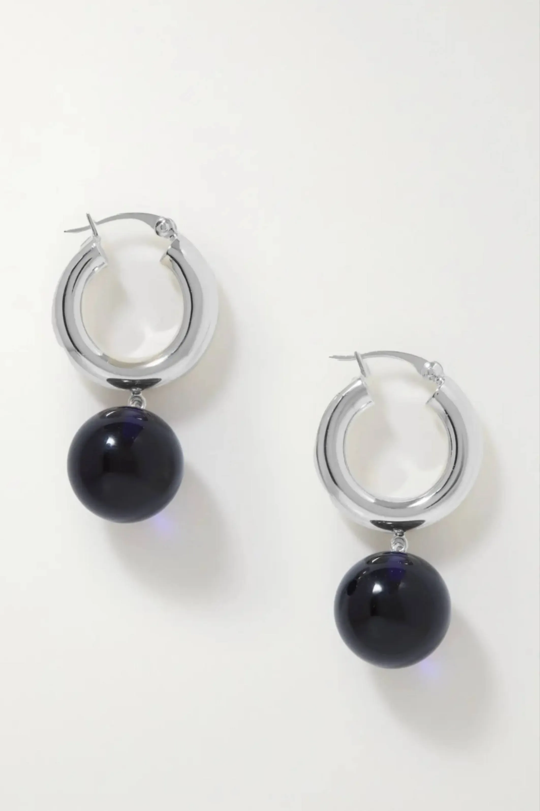 The Charlotte Earrings Silver sold by Bessette