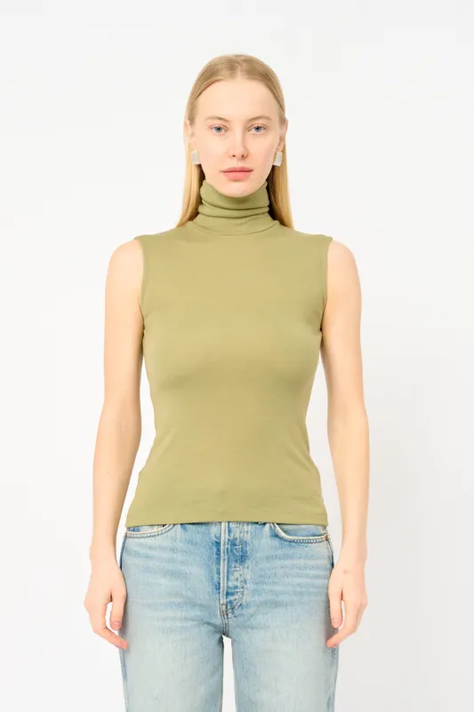Merino wool turtleneck top sold by Bessette