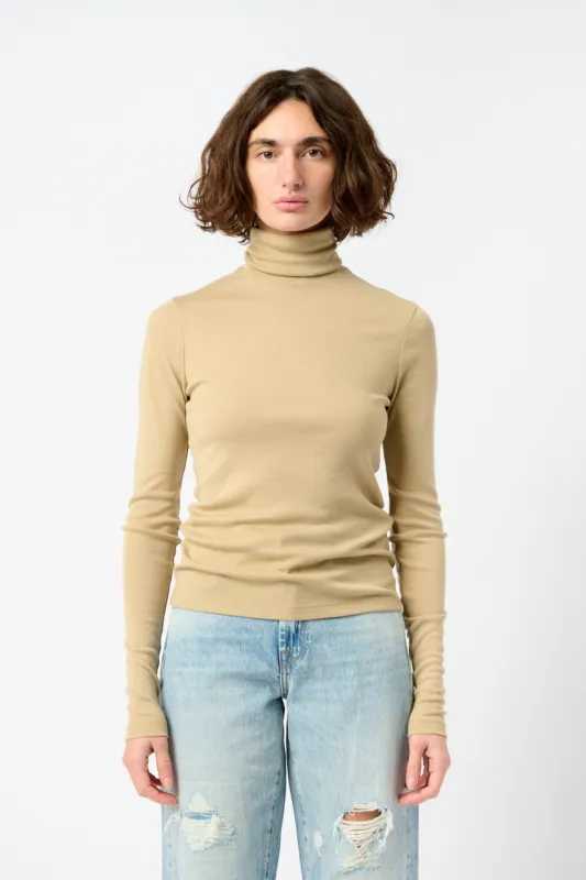 Merino wool turtleneck long sleeve sold by Bessette