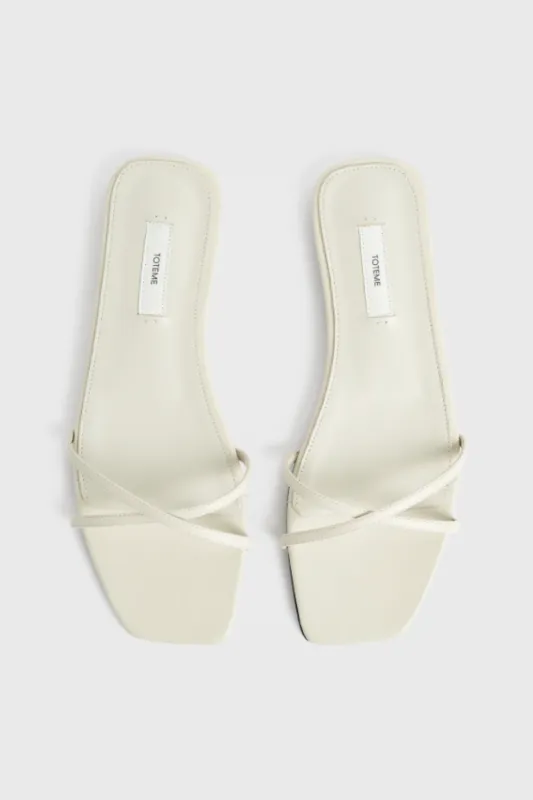 Leather Crossover Slides Off-White made by Toteme