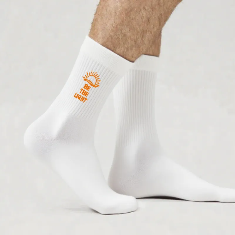 Christianartworkshop Be The Light with Glimmering Sea Horizon Crew Socks: Shine with Spirit made by Christian Art Workshop