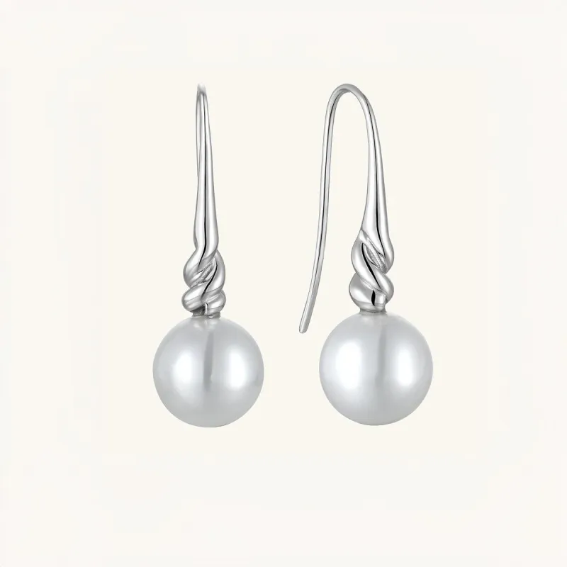 Vigorous Pearl Dangle Earrings sold by Jescojes